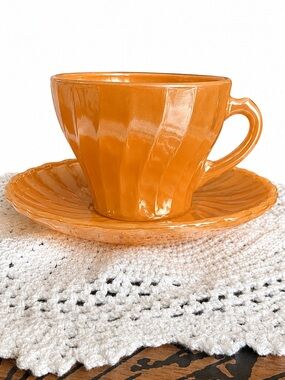 Vintage Fire-King Peach Lustre cup and saucer set by Anchor Hocking